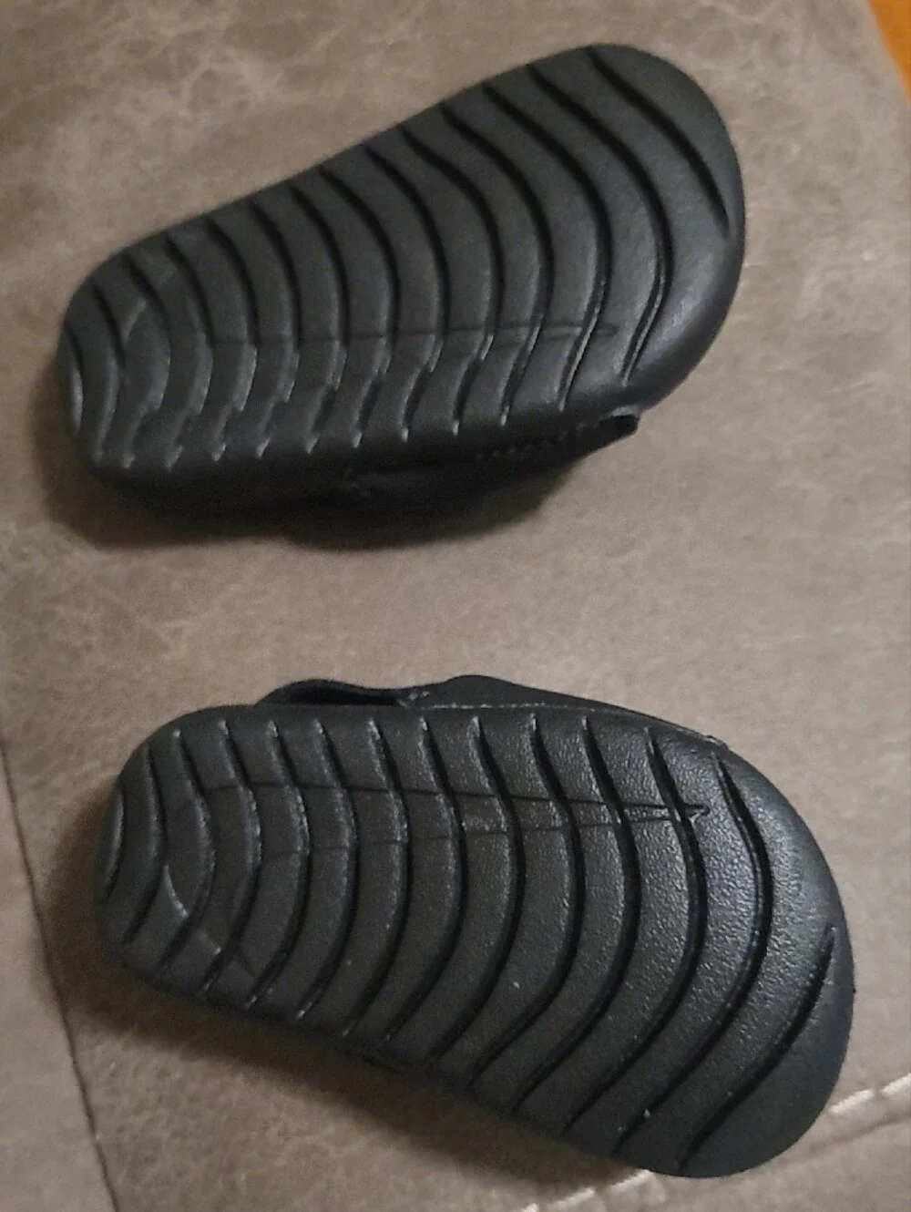 Nike Kids Black Slide Sandals with White Swoosh Accent